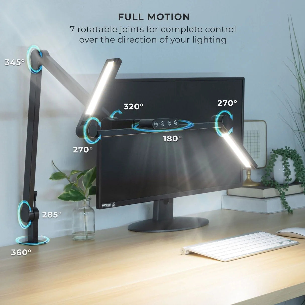 Desk setup with a monitor and adjustable lamp, featuring full motion capabilities.